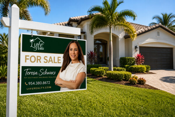 House for sale with realtor sign